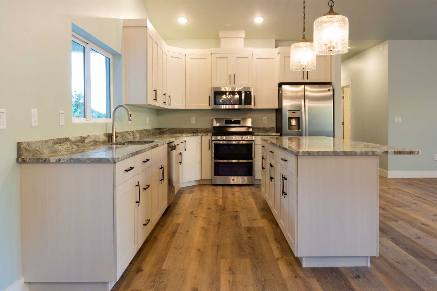 Kitchen with granite countertops and center counter