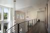 second-floor-loft-hallway-and-chandelier.jpg